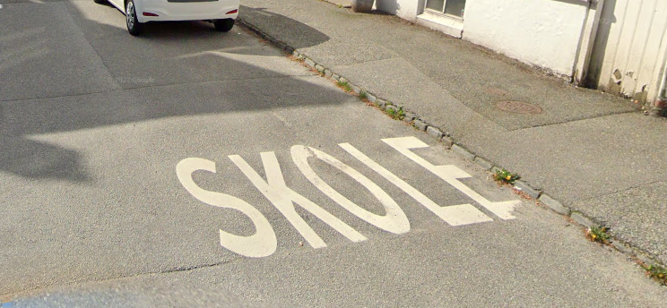 Bilde av tekst symbol for skole