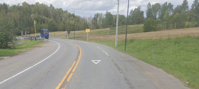 Bilde av et vikesymbol på en vei