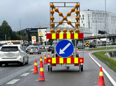 Temporary height obstacle marker indicating obstacles across or above the road