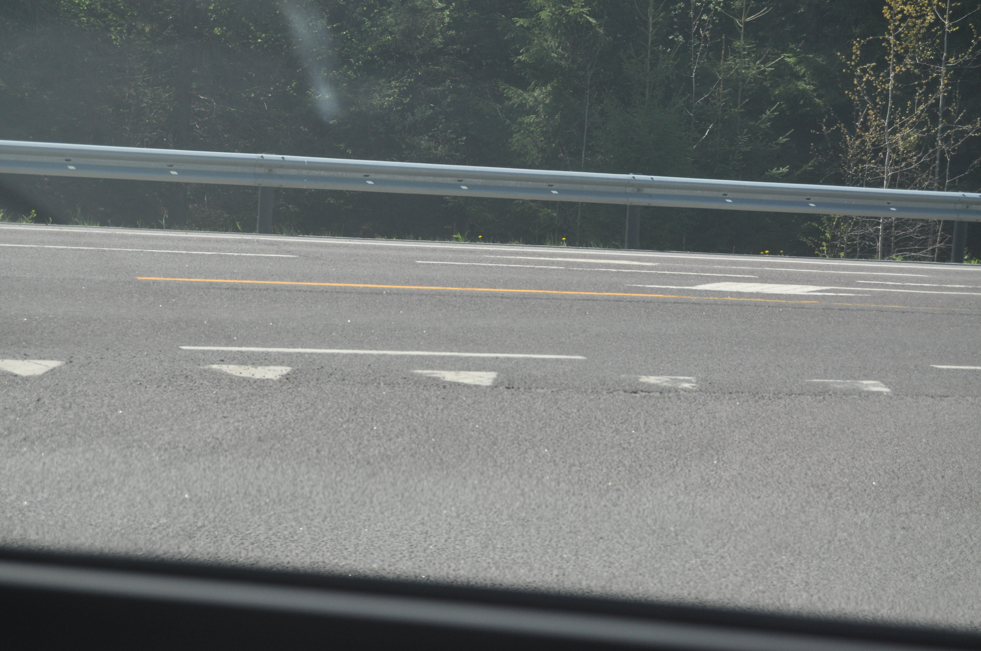 Picture of a yield line right before an intersection