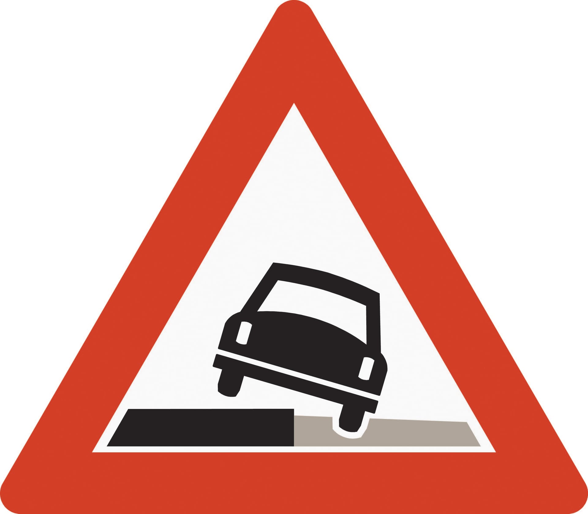 Warns of soft road shoulder